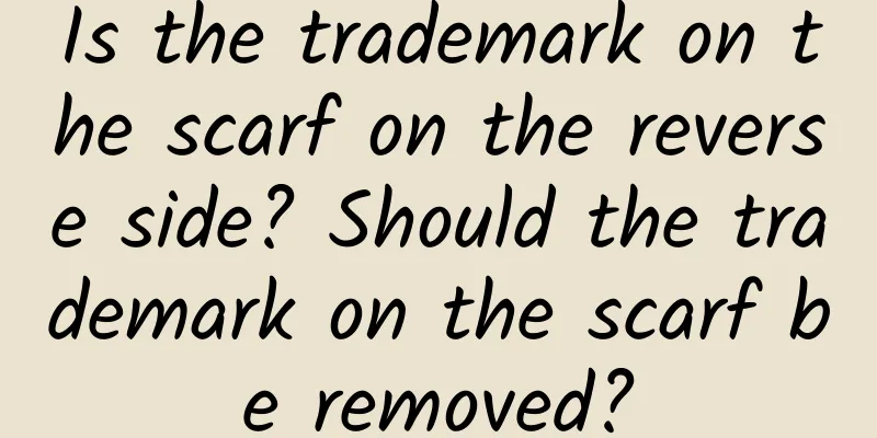 Is the trademark on the scarf on the reverse side? Should the trademark on the scarf be removed?